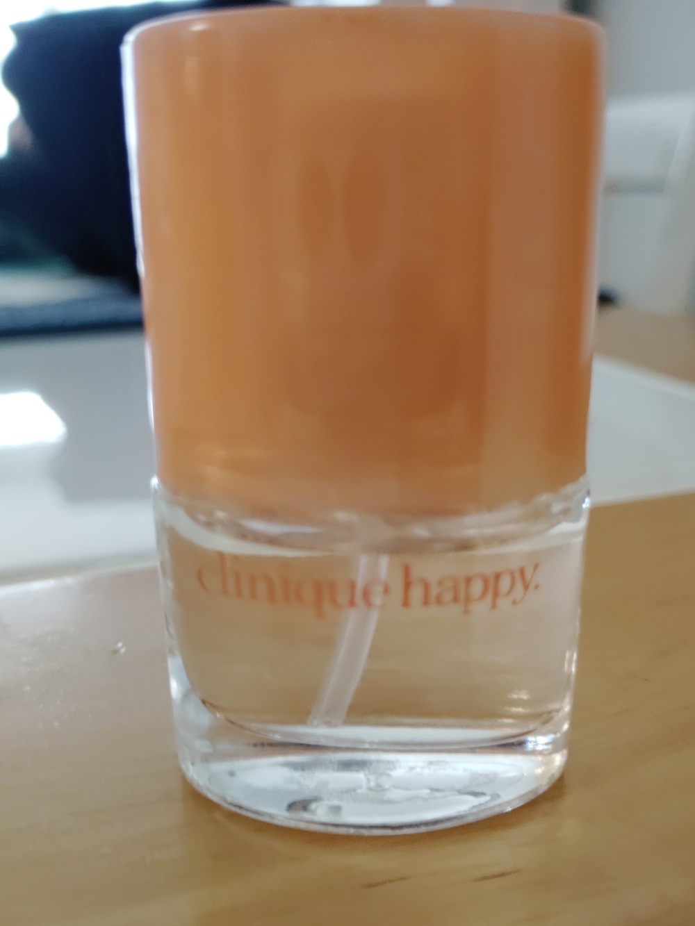 Clinique Happy Women Fragrance with Peach-Colored Cap